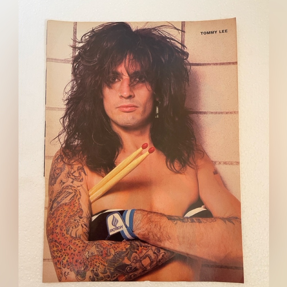 Vintage Tommy Lee pinup with Drumsticks